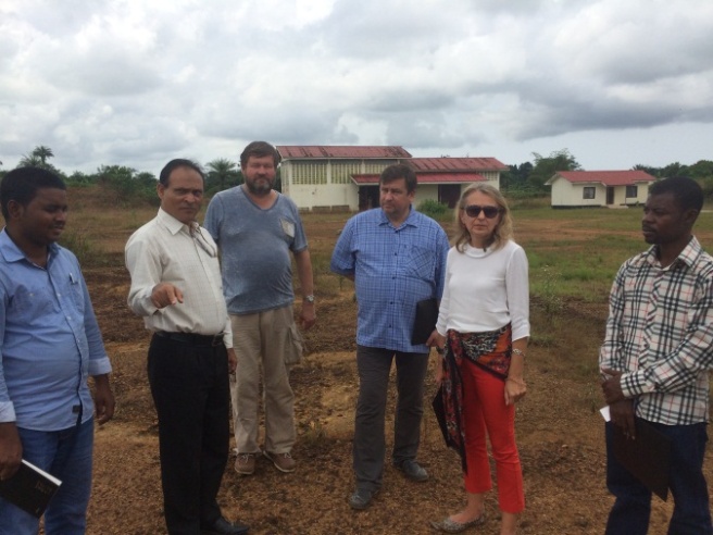 BRAC team with EU delegates in a hatchery and feed mill in Liberia.